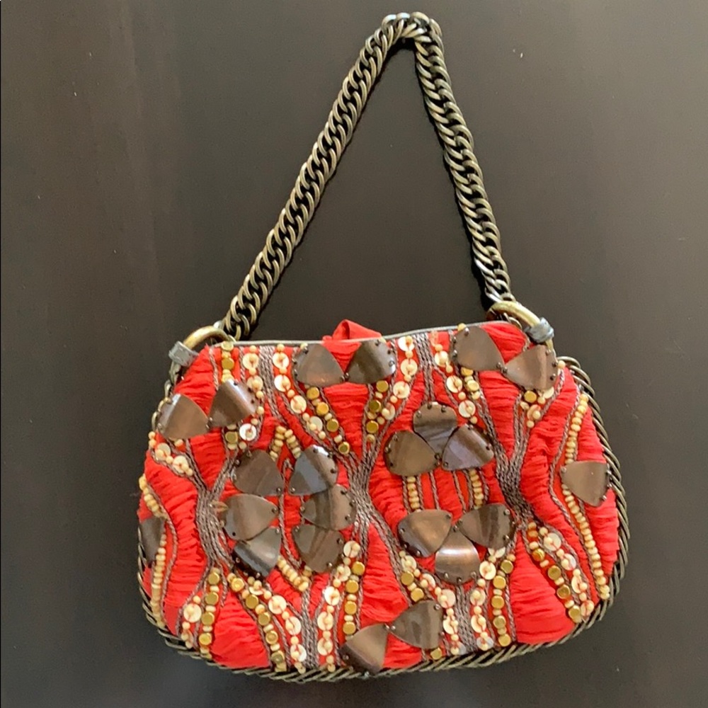Hand sewn silk handbag with ornamental detail excellent condition